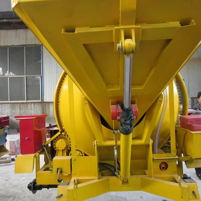 MINLE High Mixing Quality 10 14 15 M³/H Self Loading Mobile Reversing Diesel Concrete Drum Mixer With Pump