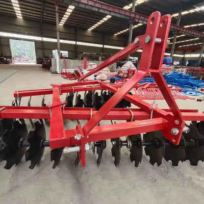 The Tractor Equipped with the Disc Plow Is Used for Plowing the Fields, Agricultural Tillage, Land Loosening, and Land Clearing