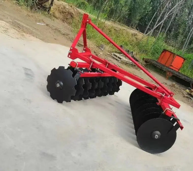 The Tractor Equipped with the Disc Plow Is Used for Plowing the Fields, Agricultural Tillage, Land Loosening, and Land Clearing