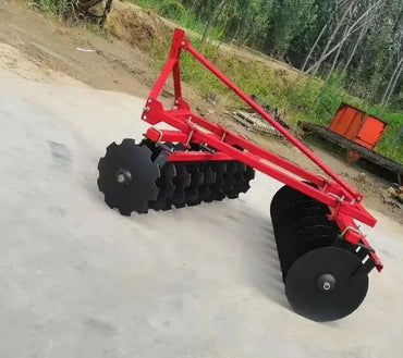 The Tractor Equipped with the Disc Plow Is Used for Plowing the Fields, Agricultural Tillage, Land Loosening, and Land Clearing