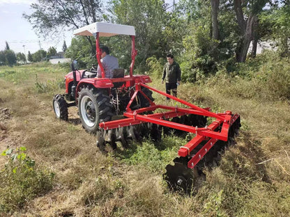 The Tractor Equipped with the Disc Plow Is Used for Plowing the Fields, Agricultural Tillage, Land Loosening, and Land Clearing